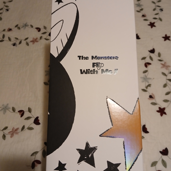 Charming Plush Creature with Striped Blue Shirt - Picture 4 of 10